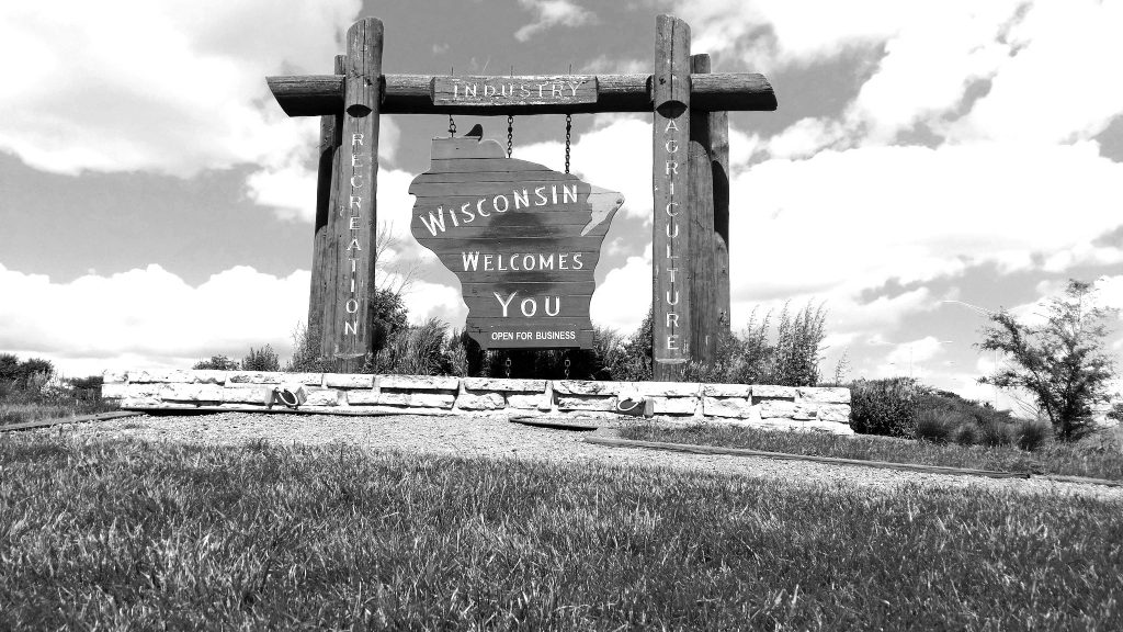 Wisconsin border sign in black and white