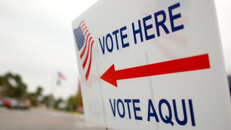 Vote here sign