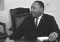 Martin Luther King at a desk