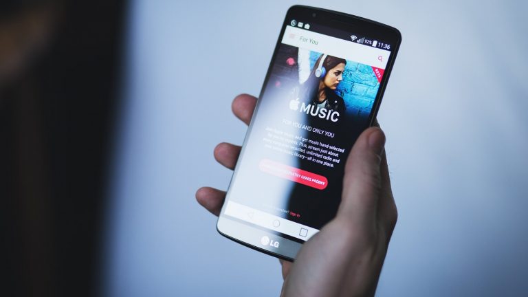 Smartphone displaying Apple Music