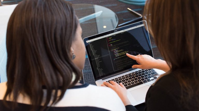 Two women at laptop