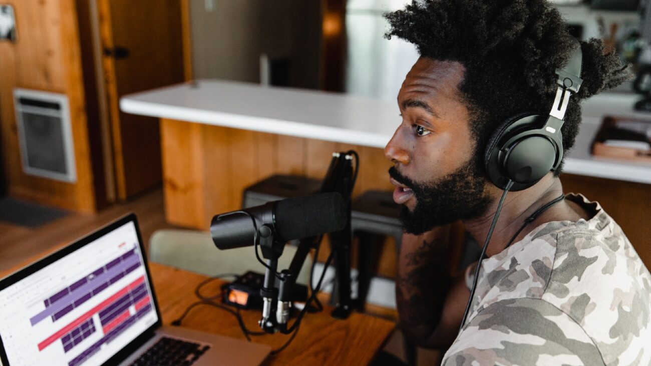 Black man recording podcast