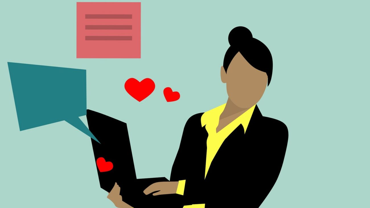 Black woman with a laptop drawing