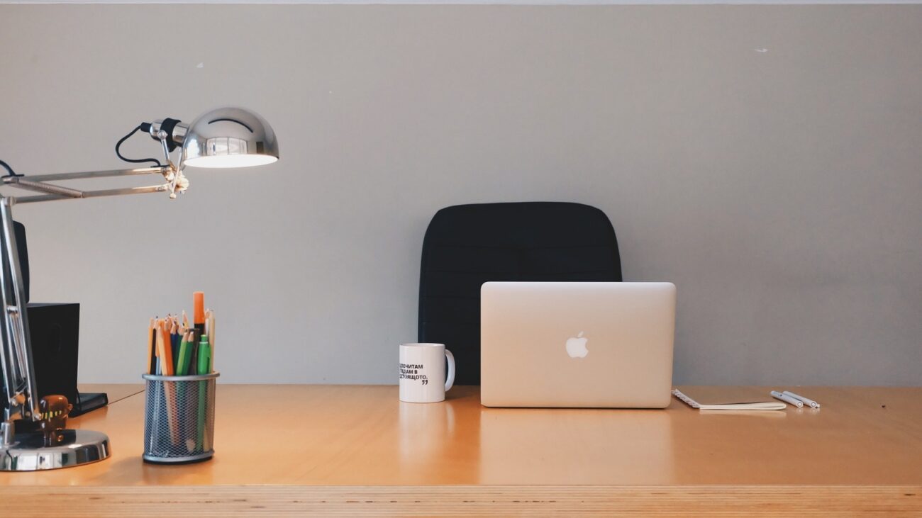 Office with desk and MacBook