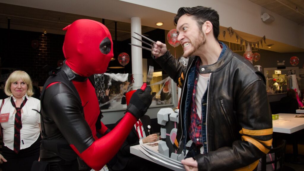 Deadpool and Wolverine cosplayers